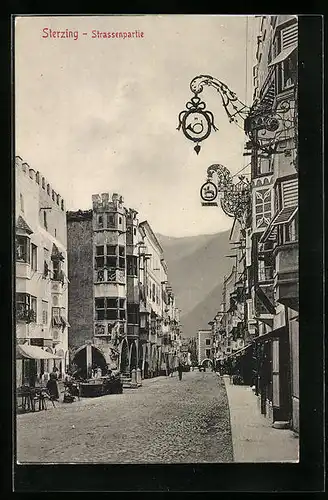 AK Sterzing, Strassenpartie mit Gasthaus und Brunnen