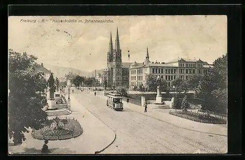 AK Freiburg i. B., Kaiserbrücke mit Johanneskirche und Strassenbahn