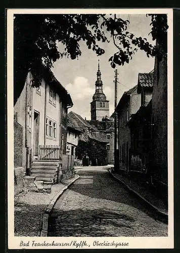 AK Bad Frankenhausen /Kyffh., Strasse Oberkirchgasse mit Kirche