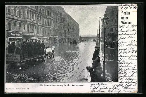 AK Berlin, Yorkstrasse mit Geschäften und Pferdewagen nach der Überschwemmung