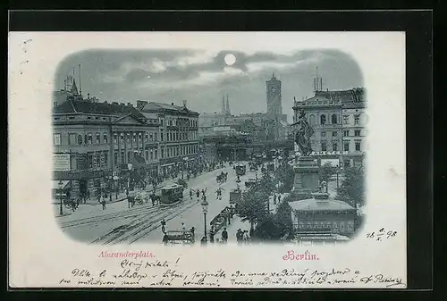 Mondschein-AK Berlin, Alexanderplatz mit Geschäften und Denkmal, Strassenbahn