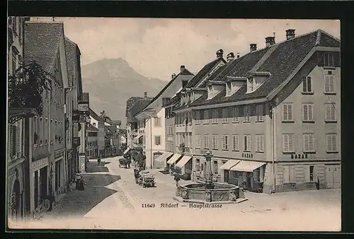 AK Altdorf, Die Hauptstrasse mit Brunnen
