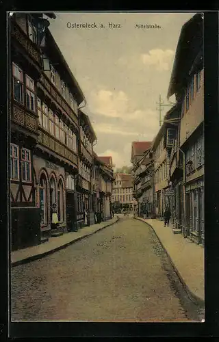 AK Osterwieck a. Harz, Mittelstrasse mit Fachwerkhäusern