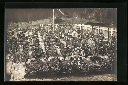 AK Remiremont, Kriegsgräber mit Blumenschmuck