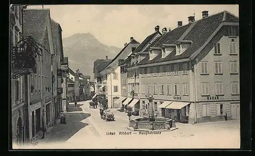 AK Altdorf, Hautpstrasse mit Geschäften und Brunnen