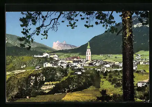 AK Kastelruth, Totale mit Kirche gegen die Geislerspitzen