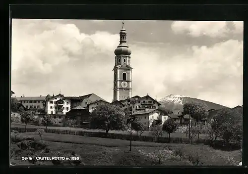 AK Kastelruth, die Kirche vor einem Dolomitenpanorama