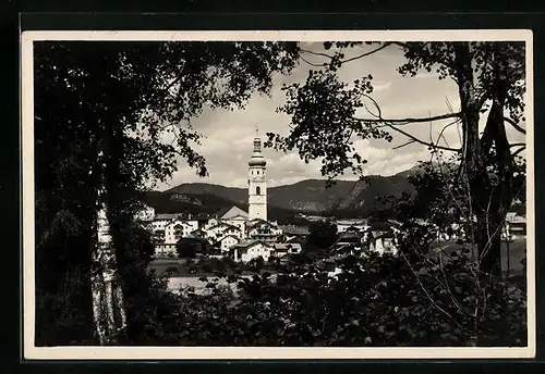 AK Kastelruth, Blick, vom Wald auf die Kirche im Ort