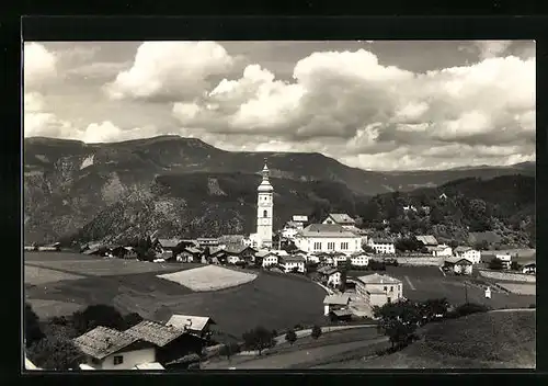 AK Kastelruth, Fliegeraufnahme der Ortschaft mit der Kirche