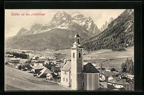 AK Sexten, an der Kirche mit Blick auf den Zwölferkogel