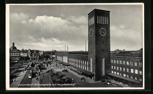 AK Düsseldorf, Wilhelmplatz mit Hauptbahnhof und Strassenbahnen