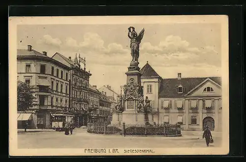 AK Freiburg i. Br., Strassenbahn am Siegesdenkmal