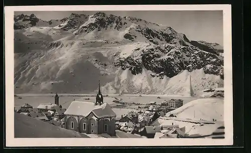 AK Andermatt, Teilansicht mit Kirche im Winter