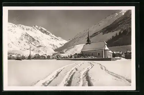 AK Andermatt, Panorama mit Kirche im Winter