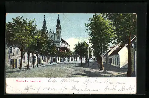 AK Maria Lanzendorf, Strassenpartie an der Kirche