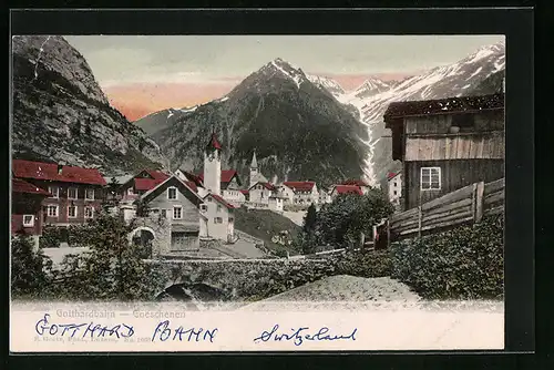 AK Goeschenen /Gotthardbahn, Ortspartie mit Kirche und Bergen