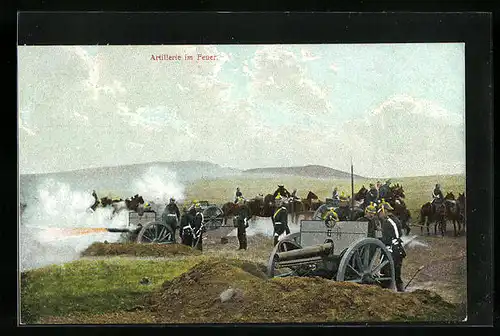 AK Artillerie im Feuer in kahler Landschaft