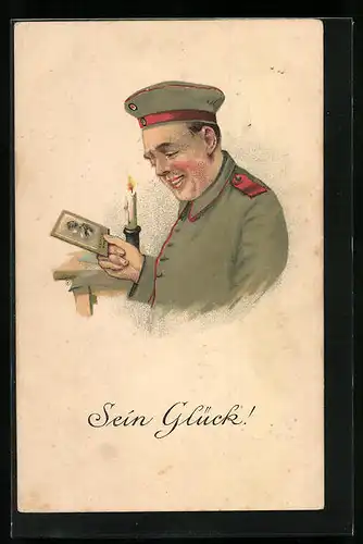 Künstler-AK Soldat betrachtet ein Foto seiner Liebsten