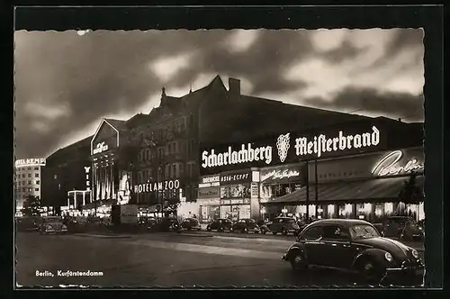 AK Berlin, Kurfürstendamm mit Hotel am Zoo bei Nacht