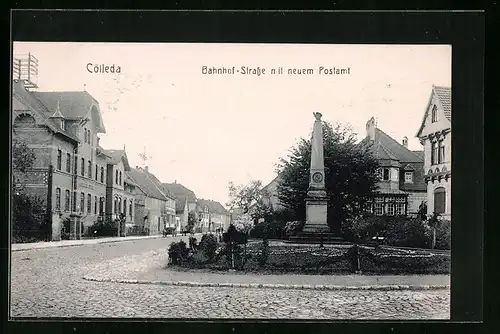 AK Cölleda, Bahnhof-Strasse mit neuem Postamt