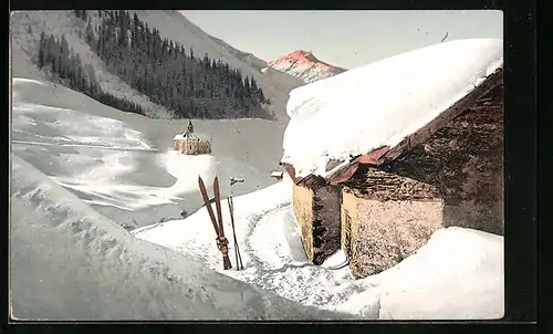 AK Andermatt, Hütte und Kirche im Winter