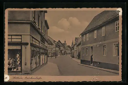 AK Kölleda, Brückenstrasse mit Geschäften