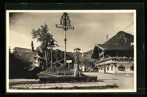 AK Ruhpolding, Ortspartie am Dorfbrunnen