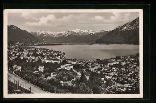AK Locarno, Blick auf die gesamte Stadt und die Alpen