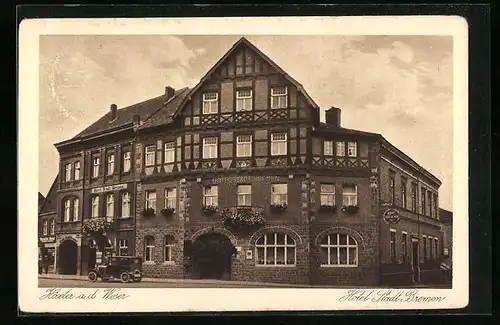 AK Höxter a. d. Weser, Hotel Stadt Bremen mit Strassenpartie
