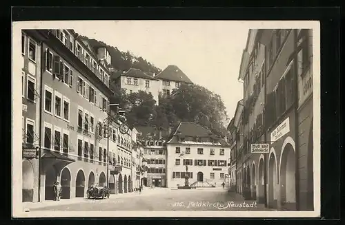 AK Feldkirch-Neustadt, Strassenpartie mit Hotel zum Loewen, Heim Dornbirn und Geschäft