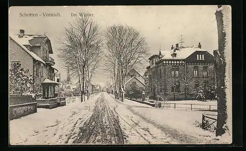 AK Schotten, Partie in der Vorstadt im Winter, mit Blick zum Kirchturm