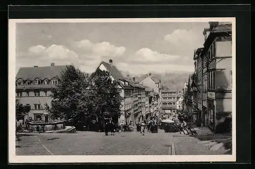 AK Pössneck i. Thür., Schuhgasse mit Brunnen