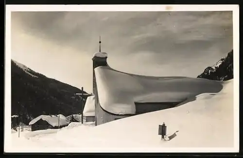 AK Langen, Ortspartie mit Kirche im Schnee