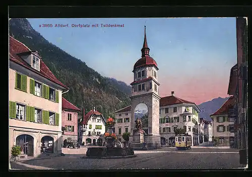 AK Altdorf, Dorfplatz mit Telldenkmal, Brunnen und Strassenbahn