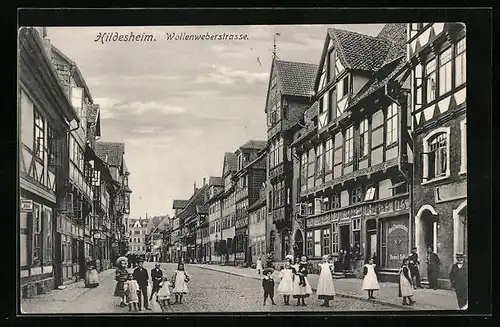AK Hildesheim, Wollenweberstrasse mit Geschäften