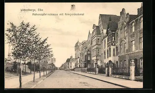 AK Wittenberge a. Elbe, Hohenzollernstrasse mit Kriegerdenkmal