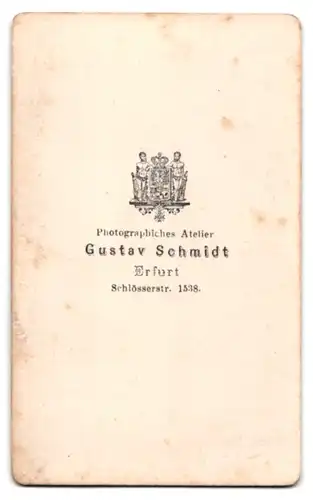 Fotografie Gustav Schmidt, Erfurt, hübsche junge Frau gemusterten Kleid mit Buch in der Hand