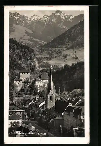 AK Feldkirch, Ortspartie aus der Vogelschau gegen Gurtisspitze