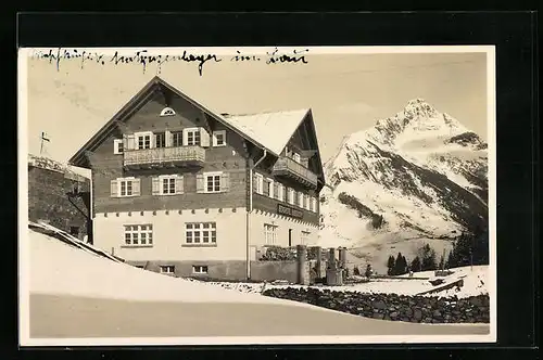 AK Warth, Berghotel Biberkopf mit Bergmassiv