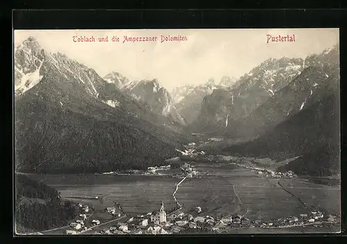 AK Toblach, Ortsansicht mit den Ampezzaner Dolomiten