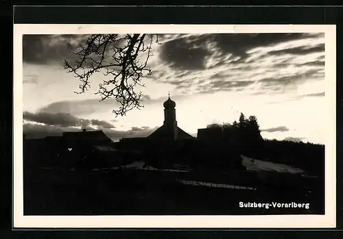 AK Sulzberg, Ortspartie mit Kirche am Abend