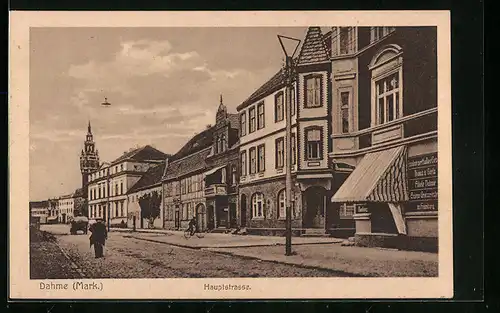 AK Dahme /Mark, Partie in der Hauptstrasse mit Geschäften und Blick auf Turm