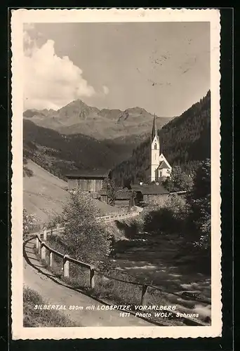 AK Silbertal, Strassenpartie zur Kirche hin mit Lobspitze