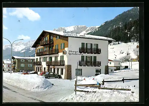 AK Campitello di Fassa, Albergo Rododendro im Winter von der Strasse gesehen