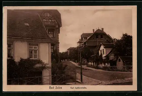 AK Bad Sulza, Karl Späterstrasse mit Laterne, Bahnpoststempel