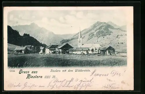 AK Riezlern, Ortspartie mit Kirche und dem Widderstein