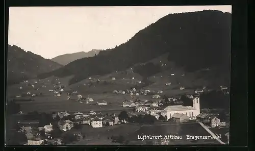 AK Hittisau, Ortsansicht mit Umgebung bei Dämmerung