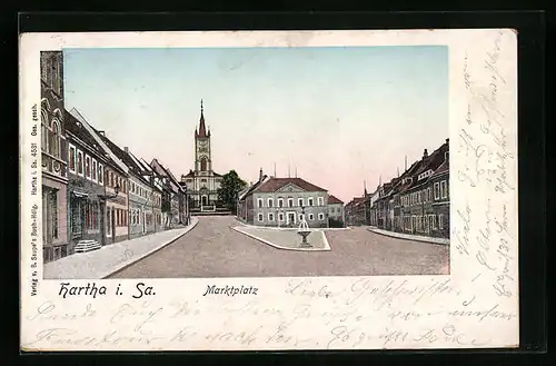 Goldfenster-AK Hartha i. Sa., Marktplatz, Gebäude mit leuchtenden Fenstern