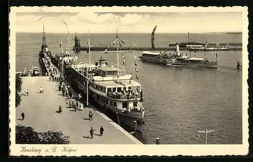 AK Konstanz a. B., Hafenpartie mit Bodensee-Dampfer Allgäu in Flaggengala