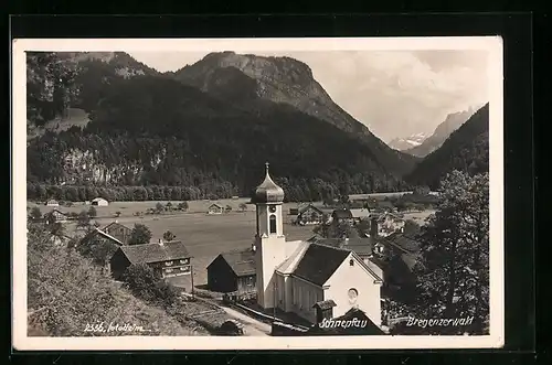 AK Schnepfau, Teilansicht mit Blick auf Berge